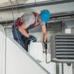HVAC technician installing McAllen TX